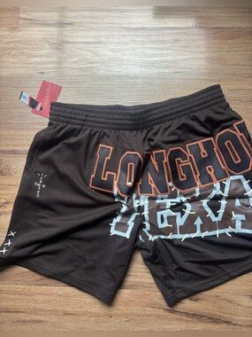 Travis Mitchell & Ness Brown Basketball Shorts with White & Orange Texas Graphic